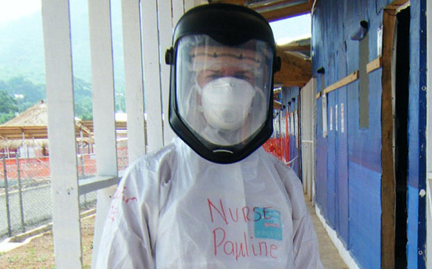 Nurse Pauline Cafferkey dressed to protect herself from the Ebola virus. She is currently recovering in hospital after having contracted the disease herself.